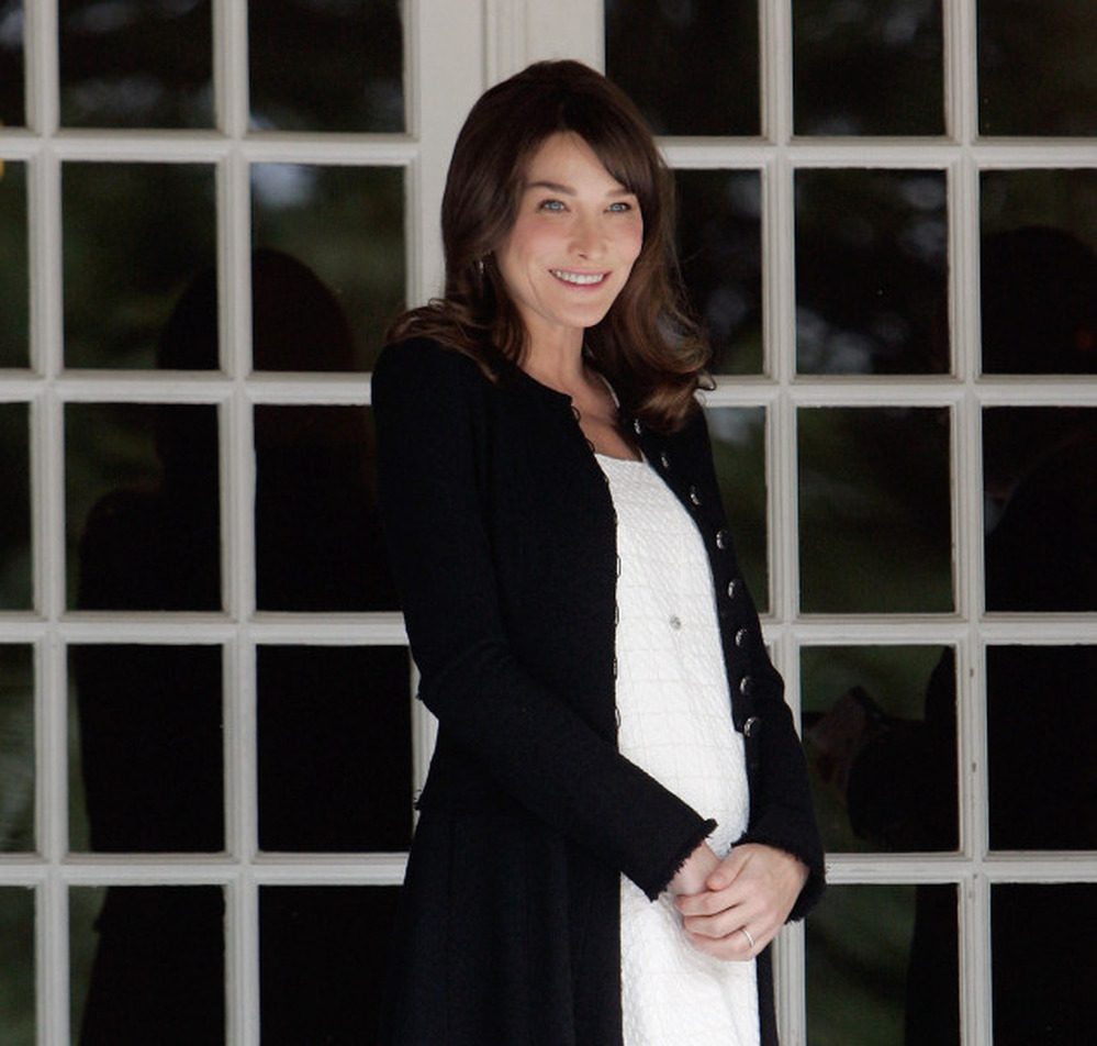 French first lady Carla Bruni-Sarkozy waits for the spouses of the Heads of Delegation participating in the G8 Summit in May. Carla Bruni-Sarkozy, 43, confirmed to the press her pregnancy and first child together with French President Nicolas Sarkozy.