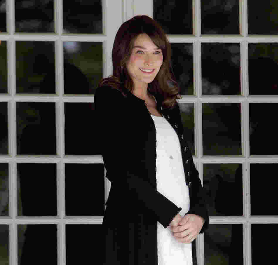 French first lady Carla Bruni-Sarkozy waits for the spouses of the Heads of Delegation participating in the G8 Summit in May. Carla Bruni-Sarkozy, 43, confirmed to the press her pregnancy and first child together with French President Nicolas Sarkozy.