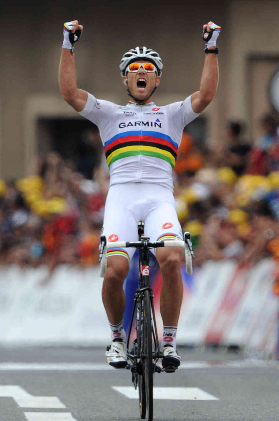 Norway's Thor Hushovd celebrates his stage win at the finish line.