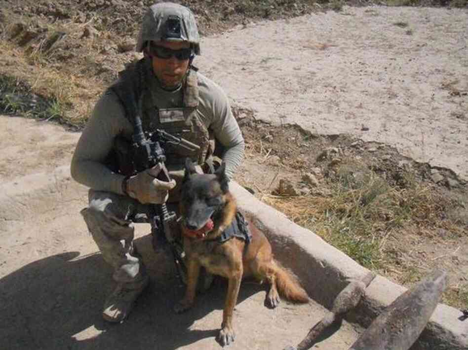 Marine Cpl. Daniel Cornier and his colleague, Chaak, in Afghanistan. "Pretty much trust him with my life," Cornier says.