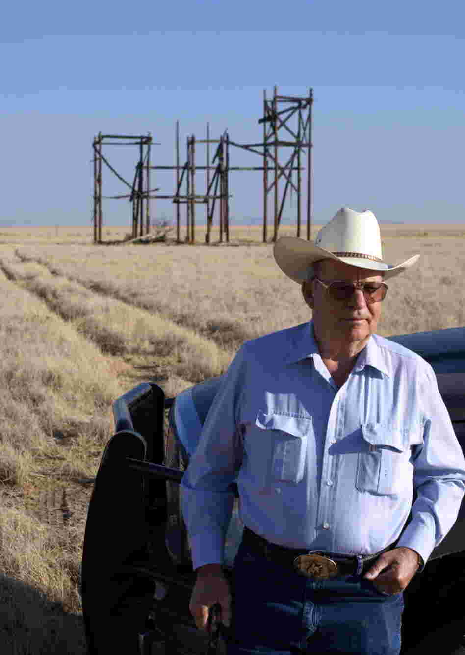 Clay Evans stands before the ruins of the mansion built for the 1956 film Giant. Evans, whose family has owned the ranch since back before the movie was filmed, recently put it up for sale.