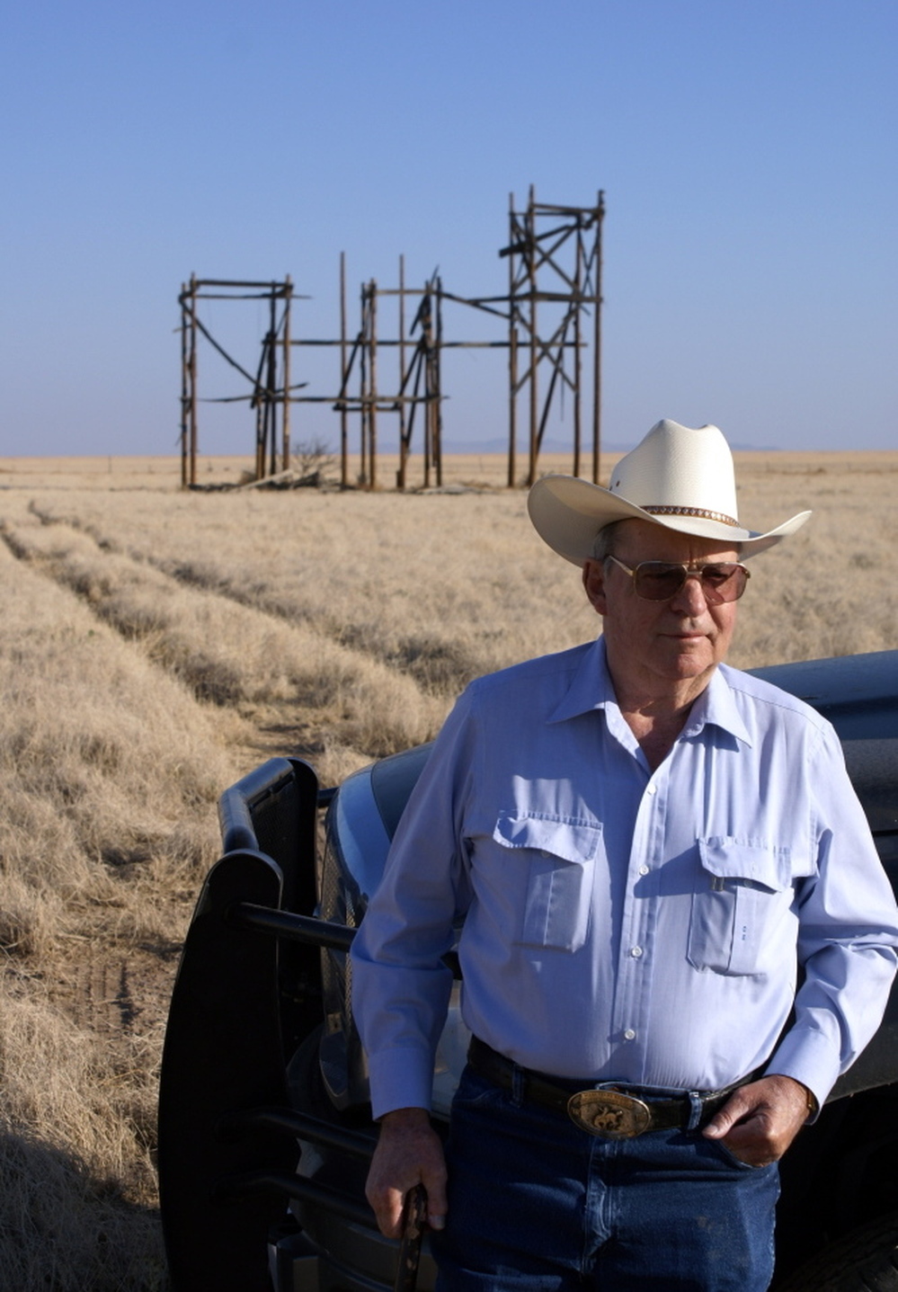 Clay Evans stands before the ruins of the mansion built for the 1956 film Giant. Evans, whose family has owned the ranch since back before the movie was filmed, recently put it up for sale.