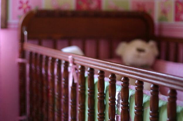 Many  cases once thought to be sudden infant death syndrome are now believed to be  accidents caused by unsafe sleep practices. The image above shows a crib with a teddy bear and bumper — items the American Academy of Pediatrics warns against putting in your baby's crib.