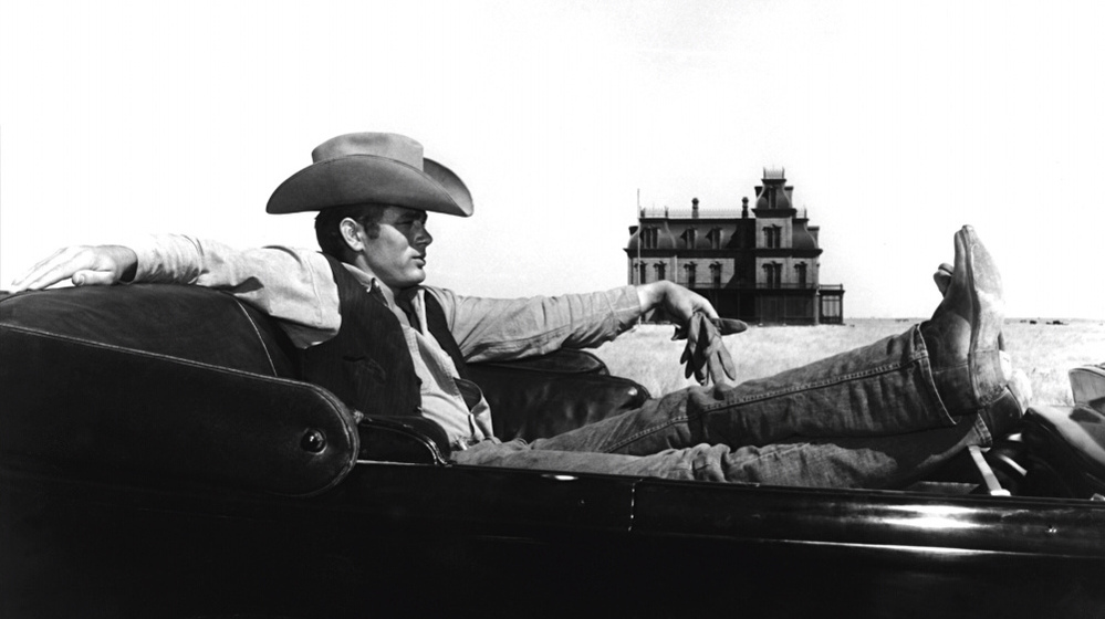 James Dean on the set of the 1956 film Giant, which was filmed on the Ryan Ranch, west of the town of Marfa. The skeleton of the mansion in the background still stands on the ranch today.