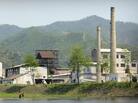 An idle North Korean factory, seen from the Chinese border.