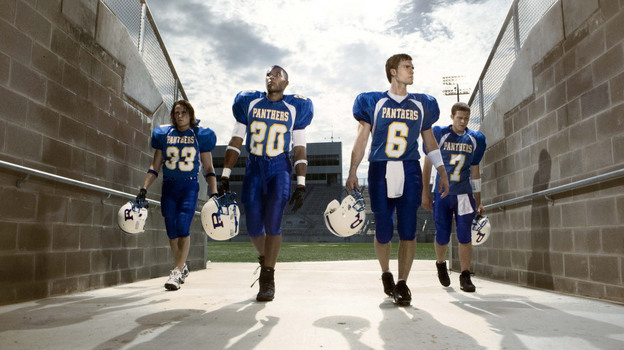 The original Friday Night Lights crew, in an NBC publicity photo, from left: Tim Riggins (Taylor Kitsch), Brian "Smash" Williams (Gaius Charles), Jason Street (Scott Porter) and Matt Sarasan (Zach Gilford).