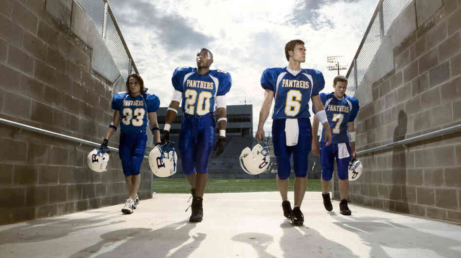 The original Friday Night Lights crew, in an NBC publicity photo, from left: Tim Riggins (Taylor Kitsch), Brian "Smash" Williams (Gaius Charles), Jason Street (Scott Porter) and Matt Sarasan (Zach Gilford).