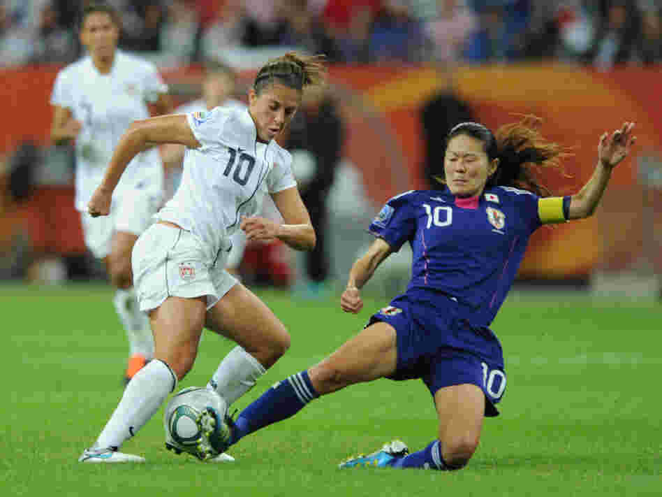 Japan's midfielder Homare Sawa (R) and USA's midfielder Carli Lloyd vie for the ball during the FIFA Women's Football World Cup final match in Frankfurt.