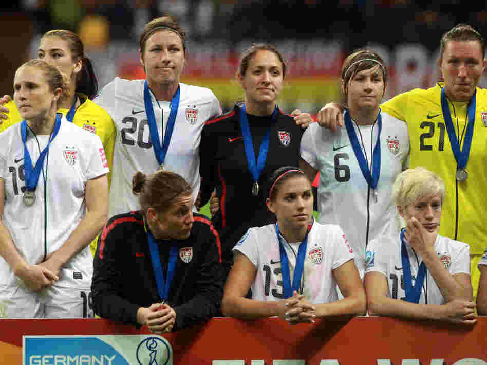 Members of the U.S. women's national team look on after losing the FIFA Women's World Cup Final against Japan. The Americans lost on penalty kicks after overtime expired with the teams tied, 2-2.
