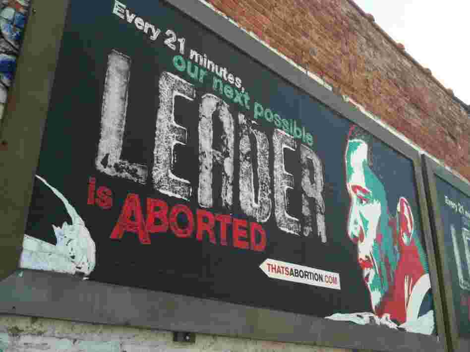 An anti-abortion billboard with President Barack Obama's image is shown by a vacant lot in the Englewood neighborhood of Chicago's South Side Saturday, April 23, 2011. The billboard is from a Texas anti-abortion group, not the Radiance Foundation, whose co-founder appeared in this interview with NPR.