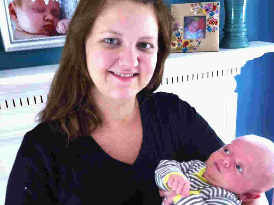 Caroline Nagy and her now 8-week-old infant in Youngstown, Ohio. Nagy says she had labor induced early at 39 weeks because she was uncomfortable and felt as though she was neglecting her other child.
