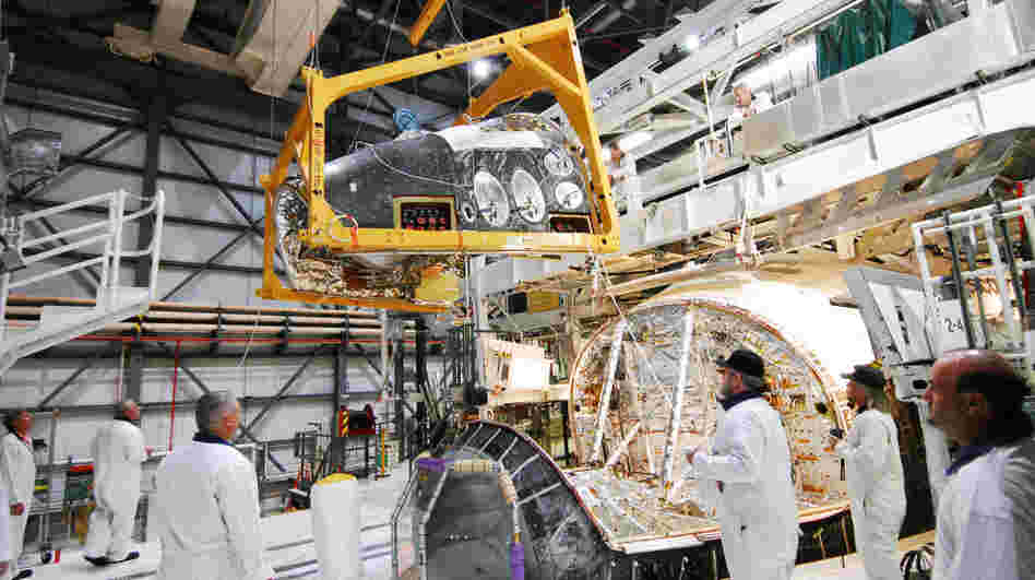 A large section of Discovery's nose, called the forward reaction control system, which helped steer the shuttle while in orbit, was removed in March. The spacecraft will be cleaned and detoxified before being put on display in museums. A large section of Discovery's nose, called the forward reaction control system, which helped steer the shuttle while in orbit, was removed in March. The spacecraft will be cleaned and detoxified before being put on display in museums.
