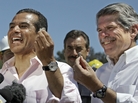 Los Angeles Mayor Antonio Villaraigosa (left) and Los Angeles County Supervisor Zev Yaroslavsky hold souvenir concrete chips as they celebrate the demolition of two lanes of the Mulholland Drive bridge over I-405 ahead of schedule Sunday. Los Angeles Mayor Antonio Villaraigosa (left) and Los Angeles County Supervisor Zev Yaroslavsky hold souvenir concrete chips as they celebrate the demolition of two lanes of the Mulholland Drive bridge over I-405 ahead of schedule Sunday.