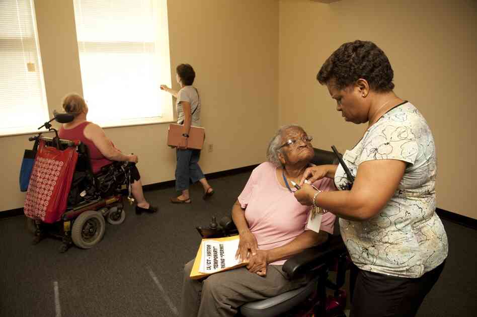 Rambert hands Hendrix keys to her first new home in six years. One thing Hendrix says she missed most when she lived at the nursing home was a door with a lock. She complained that, in the room she shared with another woman, other residents wandered in and out, day and night.