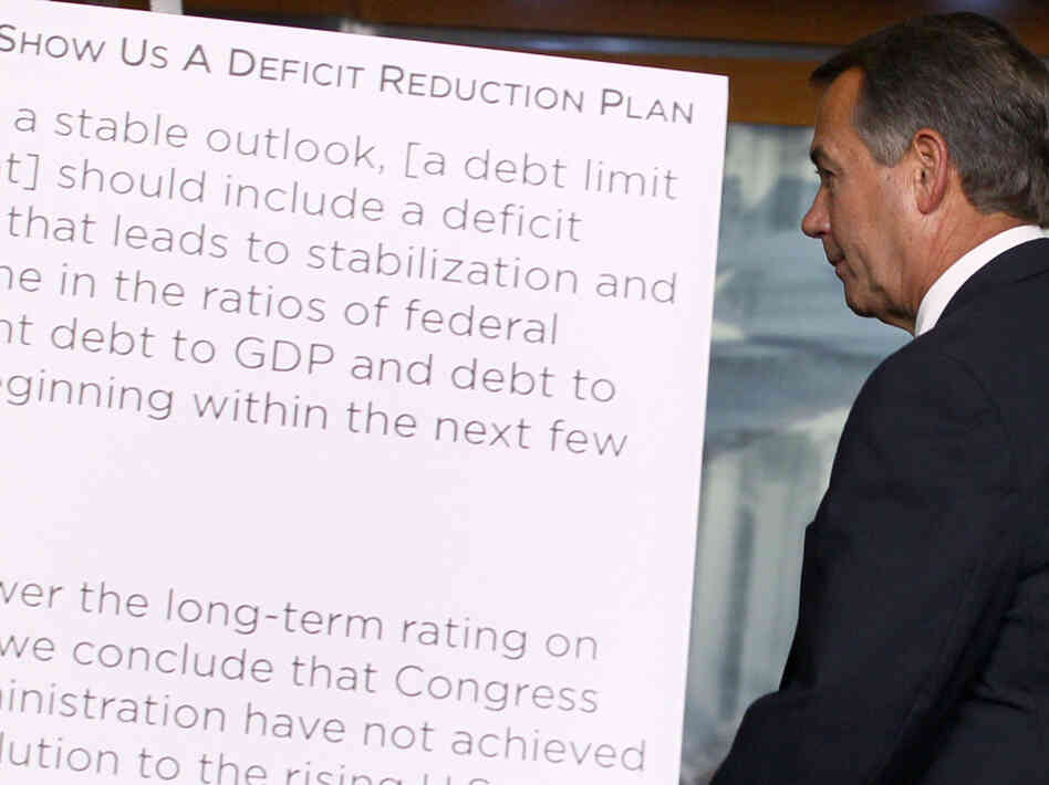 House Speaker John Boehner leaves a news U.S. Capitol news conference, July 19, 2011.