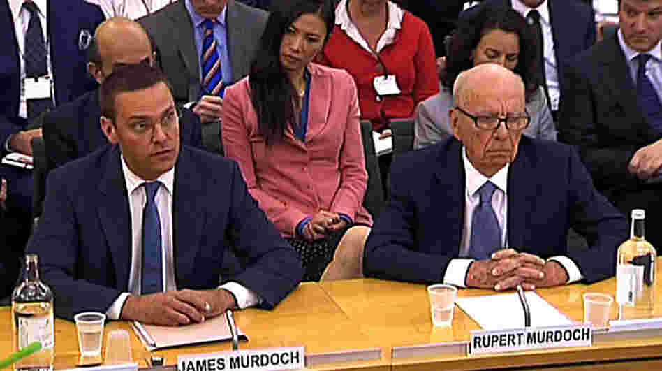 Rupert Murdoch and his son James during their testimony today in London.