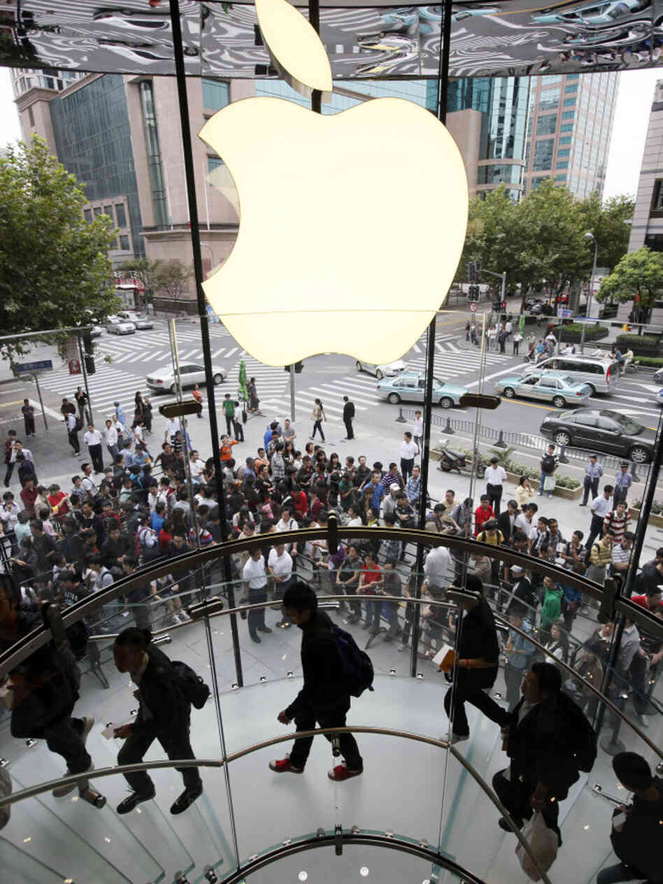 Customers line up at an Apple store for the launch of the iPhone 4 in Shanghai in 2010. Lines for everything from luxury handbags to social service programs can go on for days — literally. One entrepreneur in Shanghai will wait in line for you, for around $3 an hour.