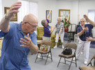 Volunteer John Kelley (left) leads an exercise class at a senior center in Oklahoma on Monday. Centers such as these offer seniors a cool place to go during heat waves. Volunteer John Kelley (left) leads an exercise class at a senior center in Oklahoma on Monday. Centers such as these offer seniors a cool place to go during heat waves.