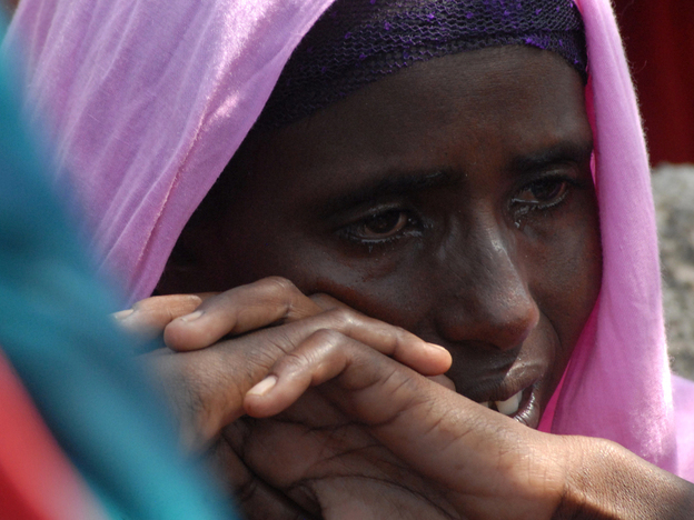 Monday (July 18, 2011): At a refugee camp near Mogadishu, a Somali woman cries after the death of one of her children.