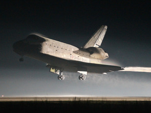 Space Shuttle Atlantis lands at Kennedy Space Center July 21, 2011 in Cape Canaveral, Florida. Space Shuttle Atlantis lands at Kennedy Space Center July 21, 2011 in Cape Canaveral, Florida.