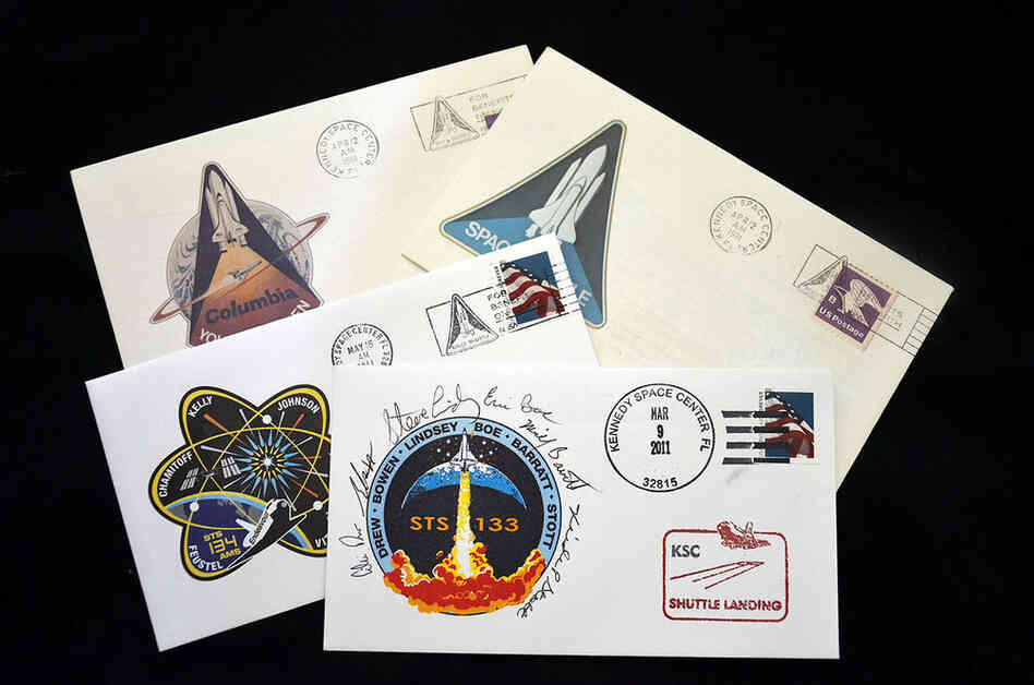 Collectible envelopes postmarked for the first space shuttle launch in 1981 and the recent last flights of shuttles Discovery and Endeavour. These philatelic "covers" were created for all 135 shuttle missions. They're popular items for crews to autograph.