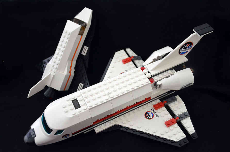 Two space shuttle models built from the popular Lego brick sets. The Denmark-based company released 10 different space shuttle-themed sets over the course of the 30 years of the shuttle program, but only one featured the NASA logo. These two represent the same models flown to space on the shuttle during the final missions.