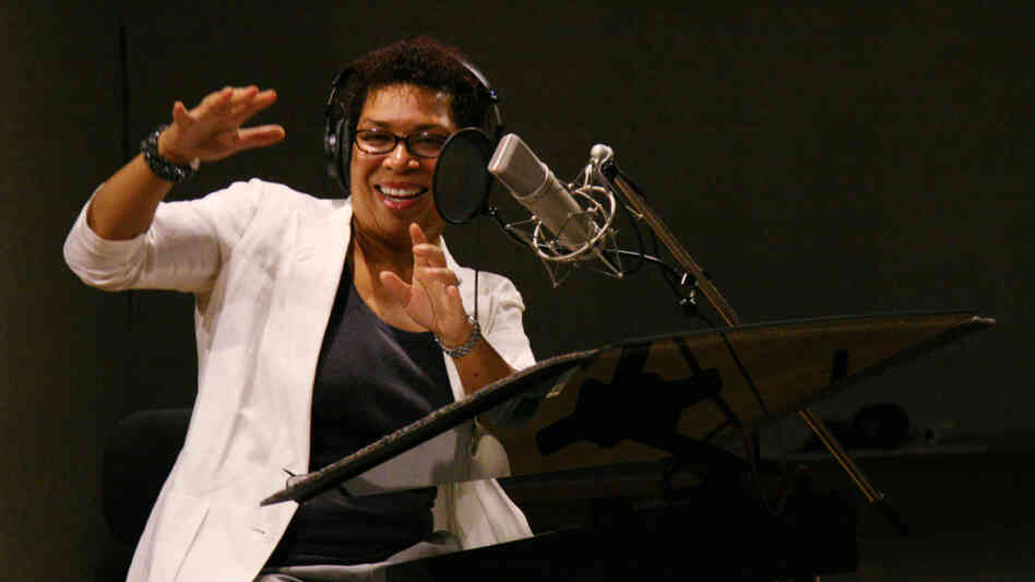 NPR host Michel Martin enjoys a performance chat with Marsha Wash at NPR headquarters in Washington, D.C., on July 20.