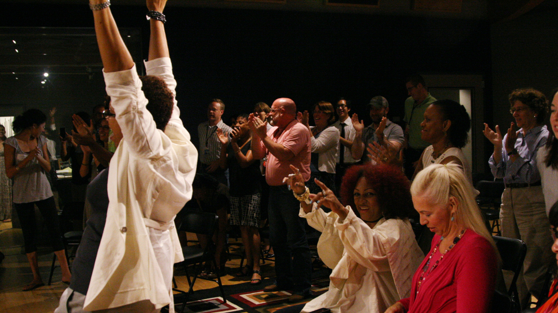 Audience members cheer for Martha Wash after she finishes her performance chat at NPR headquarters in Washington, D.C., on July 20.