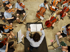 Cellist Sara Page (center, right) rehearses with the World Youth Symphony Orchestra at Interlochen Arts Camp. Page is among the campers who made an exceptional effort to raise funds to attend the camp this year. Cellist Sara Page (center, right) rehearses with the World Youth Symphony Orchestra at Interlochen Arts Camp. Page is among the campers who made an exceptional effort to raise funds to attend the camp this year.