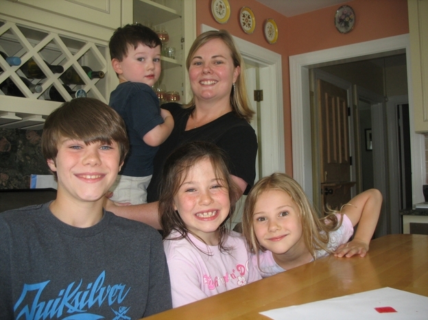 Sarah Bullard with her four children, Liam, Fay, Olivia and Joshua. They bought a house in Bristol, R.I., but then Bullard's husband got orders to work at the Pentagon. So now they live apart.