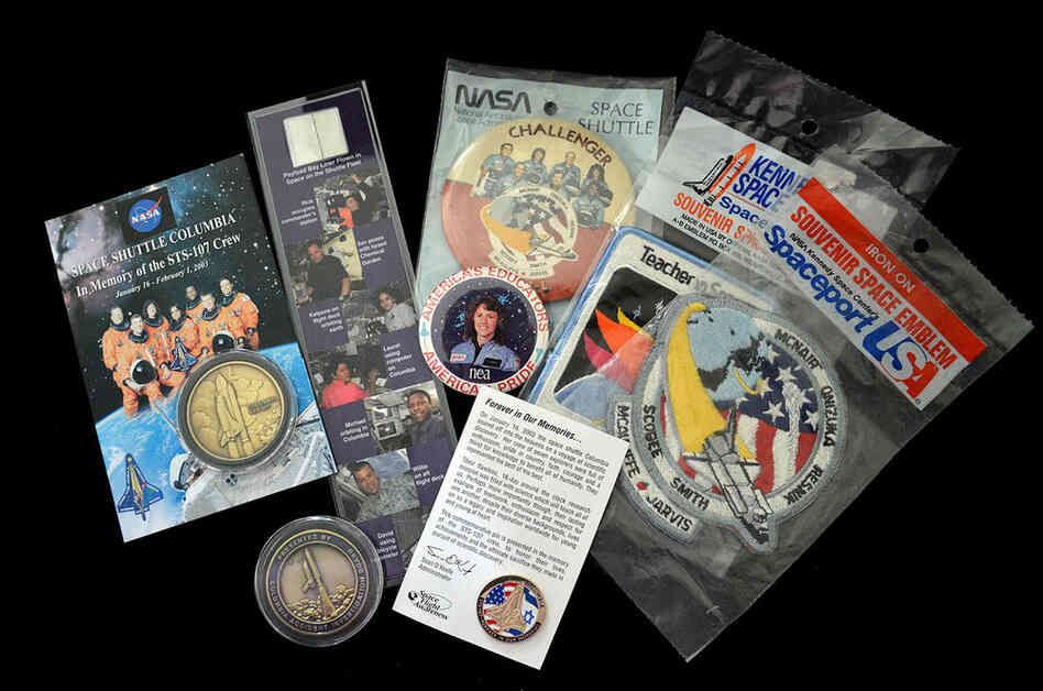 Memorabilia related to the two space shuttle tragedies: Challenger's STS-51L mission in 1986 and Columbia's STS-107 mission in 2003. Many people saved items from these flights to have a tangible memory of the fallen astronauts and the lost orbiters.