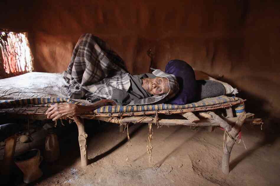 An elderly refugee rests in the Ifo refugee camp on July 20. 