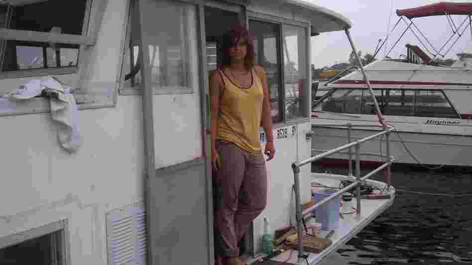 Constance Hockaday on the deck of one of her floating hotels at Marina 59 in Jamaica Bay, Queens.