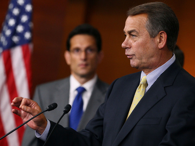 House Speaker John Boehner makes a point at a news conference as Majority Leader Eric Cantor listens, July 22, 2011.