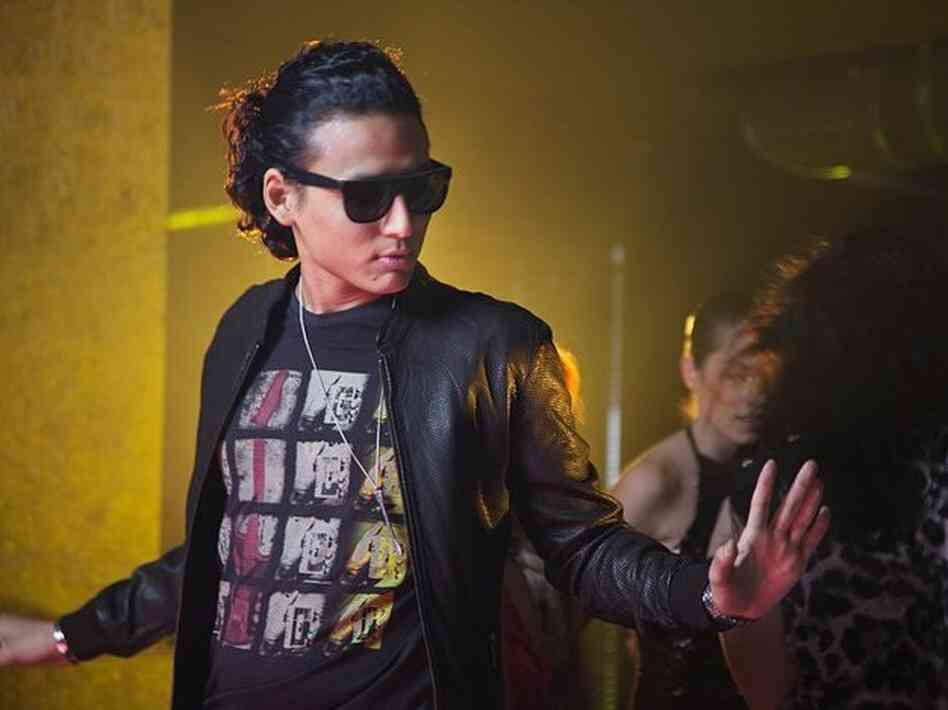 Gomo Tulku, on the set of the music video for "Photograph."