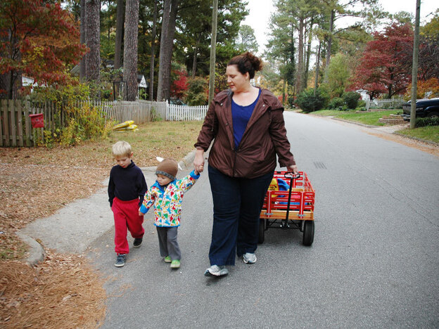 As  part of her  exercise routine, Curtis starts most mornings walking  a gaggle of neighborhood toddlers to their day care.