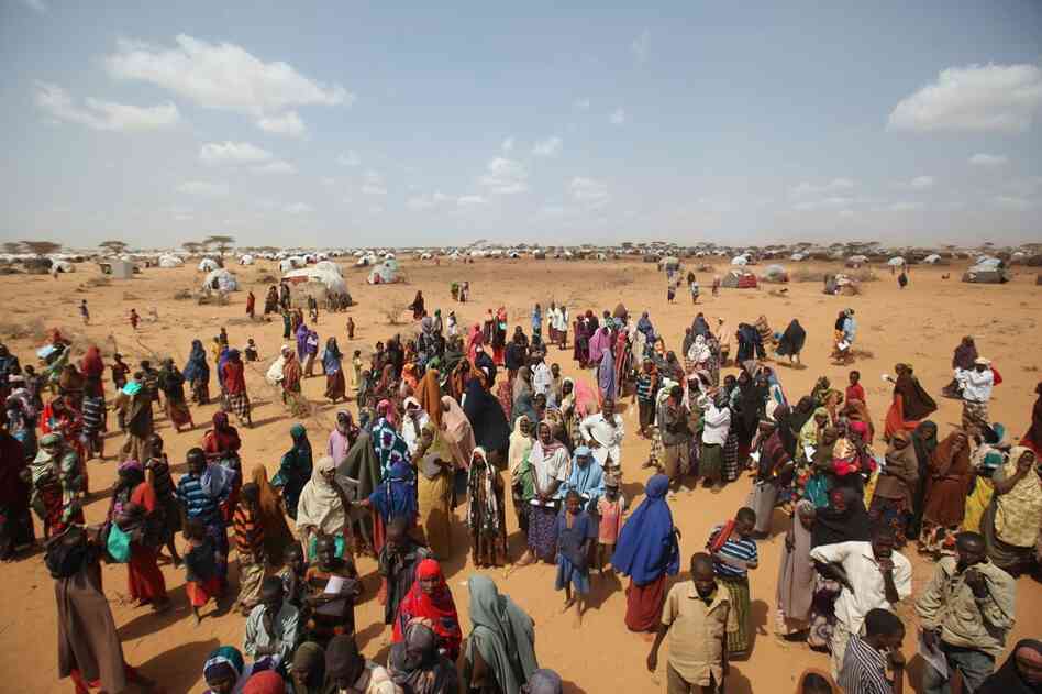 Newly arrived refugees wait for tents at the Dagahaley camp on July 21. The refugee settlement at Dadaab was designed in the early 1990s to accommodate 90,000 people, but the U.N. estimates more than four times as many reside there. 