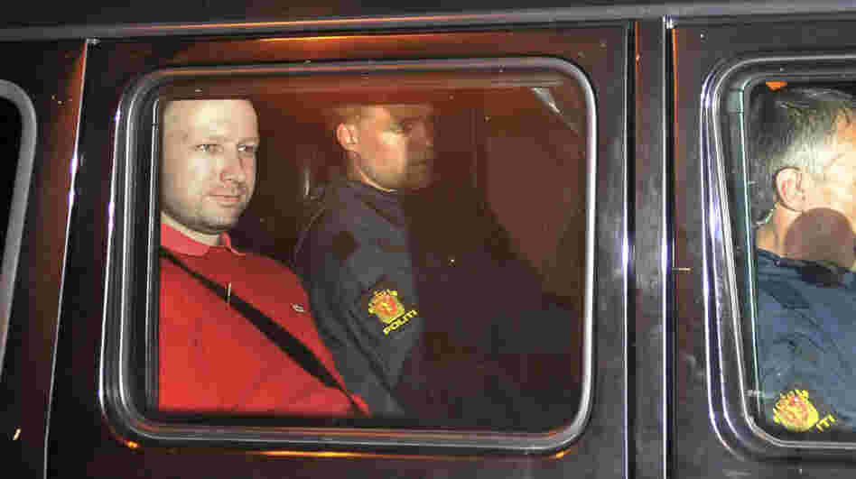 Anders Behring Breivik (left) exited an Oslo courthouse in an armored police vehicle following a hearing Monday at which he pleaded not guilty to one of the deadliest modern mass killings in peacetime.