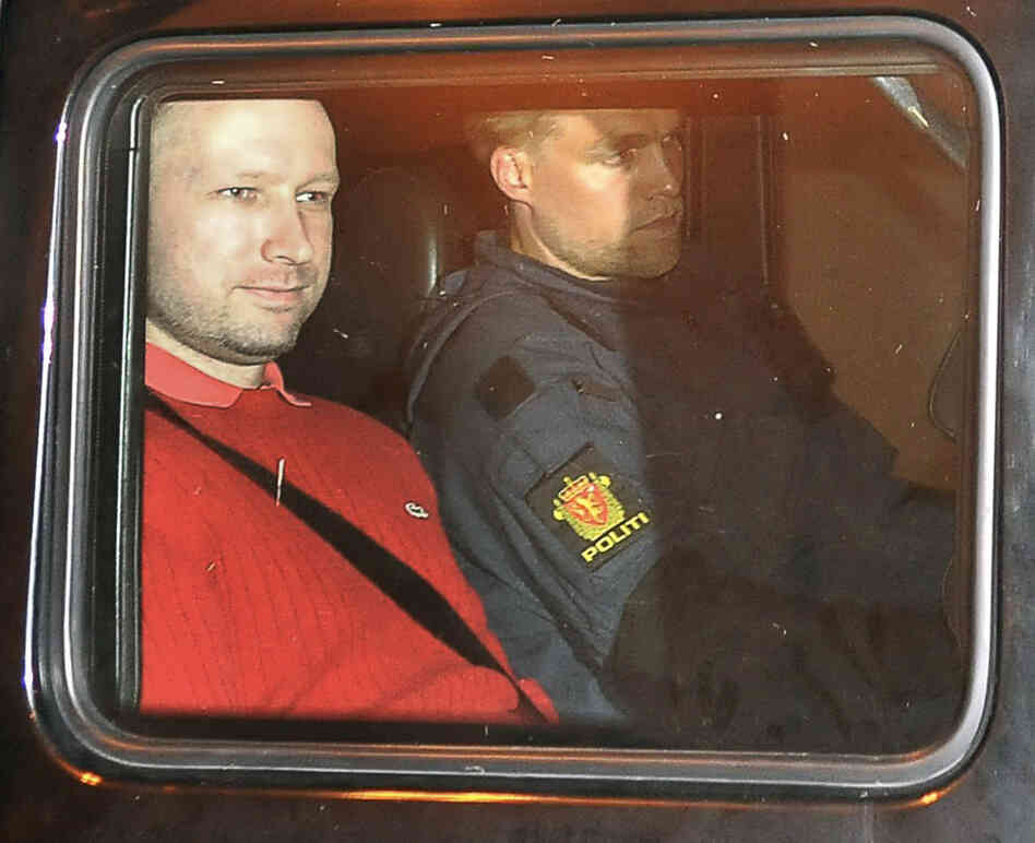 Bomb and terror suspect Anders Behring Breivik leaves the courthouse  in a police car  in Oslo on July 25.