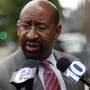 Mayor Michael Nutter speaks to members of the media during a visit to Powel Elementary School in June.