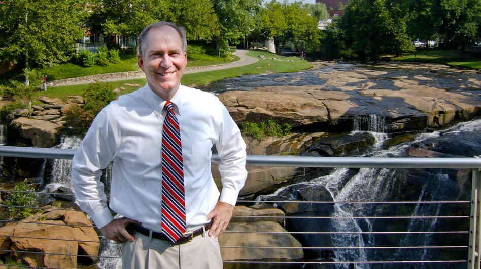 Mayor Knox White has led Greenville, S.C., for 15 years, and is running unopposed for another term. Here, he stands near a natural waterfall that's in the middle of the city's downtown, in a park that cost $13 million. "Within two years," he says, "over $100 million in private investment was created around the park." Mayor Knox White has led Greenville, S.C., for 15 years, and is running unopposed for another term. Here, he stands near a natural waterfall that's in the middle of the city's downtown, in a park that cost $13 million. "Within two years," he says, "over $100 million in private investment was created around the park."