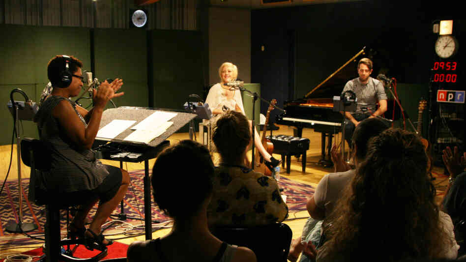 Host Michel Martin and a live audience applaud Ellie Goulding's performance at NPR headquarters in Washington D.C., on July 25.