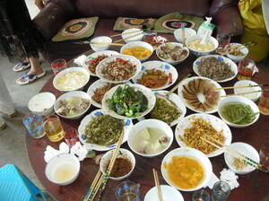 A banquet meal at a village in Guizhou. A banquet meal at a village in Guizhou.