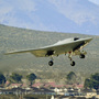 A drone takes its first flight at Edwards Air Force Base in California in February. In the near future, drones could be used outside of the military for things like traffic helicopters or flying jumbo jets. A drone takes its first flight at Edwards Air Force Base in California in February. In the near future, drones could be used outside of the military for things like traffic helicopters or flying jumbo jets.
