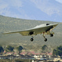 A drone takes its first flight at Edwards Air Force Base in California in February. In the near future, drones could be used outside of the military for things like traffic helicopters or flying jumbo jets. A drone takes its first flight at Edwards Air Force Base in California in February. In the near future, drones could be used outside of the military for things like traffic helicopters or flying jumbo jets.