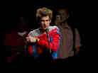 Actor Andrew Garfield asks a question from the audience wearing a Spider-Man costume  during the Sony panel presentation of The Amazing Spider-Man at Comic Con last Friday.