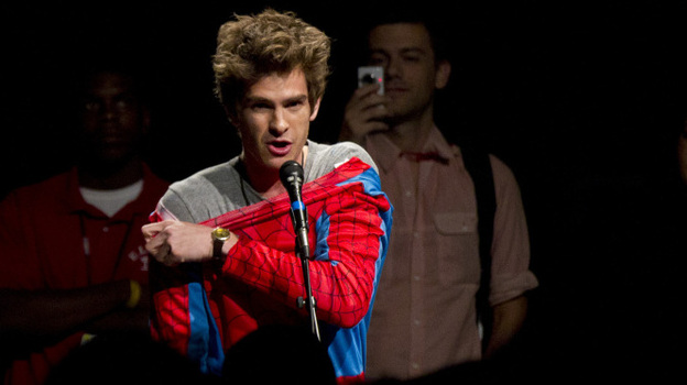 Actor Andrew Garfield asks a question from the audience wearing a Spider-Man costume  during the Sony panel presentation of The Amazing Spider-Man at Comic Con last Friday.