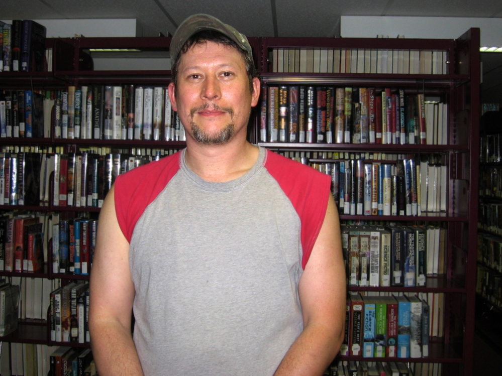Kenny Buchanan, 44, dropped out of school as a teenager. He lost his job when the economy collapsed.