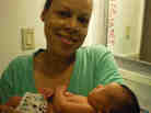 Lateefah holds her daughter Dalia.