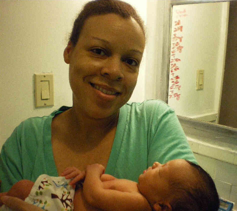 Lateefah holds her daughter Dalia. Lateefah holds her daughter Dalia.